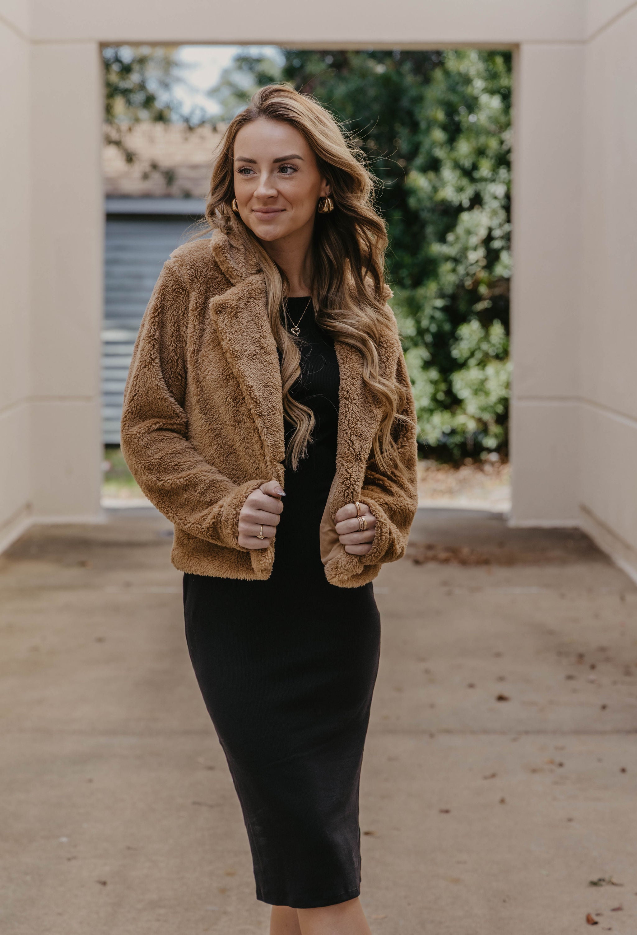 tan fuzzy coat from Peake Chic