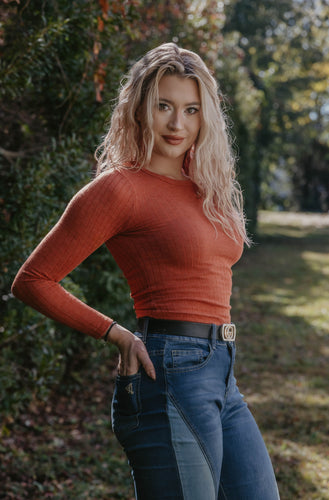 orange top from Peake Chic